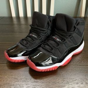 Black and red Bred 11s